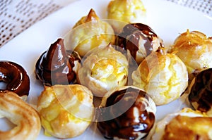 Chocolate and lemon-vanilla profiteroles