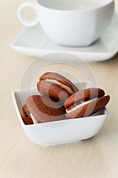 Chocolate marron cookies with nuts cream photo