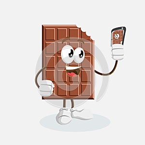 Chocolate Mascot and background with selfie pose