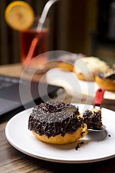 Chocolate Meses Doughnut on white plate