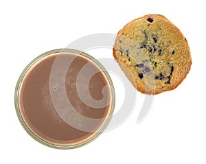Chocolate milk with a blueberry muffin.