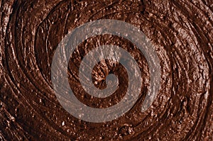 Chocolate milk smeared brown background horizontal blurred around edges
