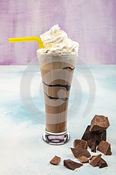 Chocolate Milk and Whipped Cream on Wooden Background