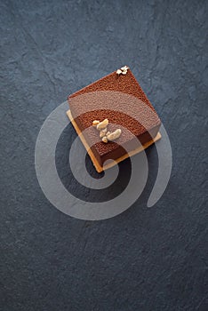 Chocolate mousse dessert on slate background