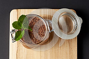 Chocolate mousse with mint in a glass jar