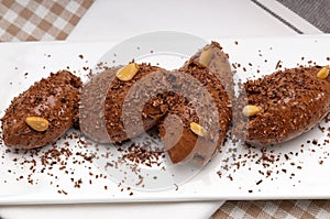 Chocolate mousse quenelle dessert