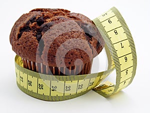 Chocolate muffin & measuring tape