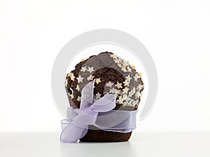Chocolate muffin wrapped up as a gift