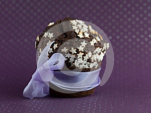Chocolate muffin wrapped up as a gift