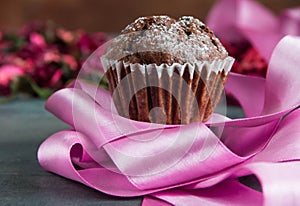 chocolate muffins with pink ribbon