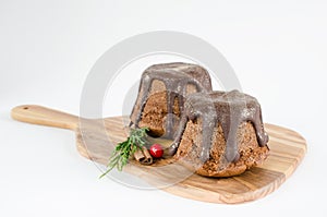 Chocolate muffins on white background photo