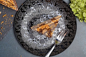 Chocolate nut cake on a dark background