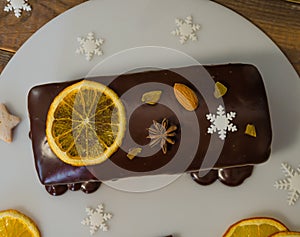 Chocolate orange Christmas  cake with fir tree and other decoration