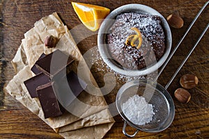 Chocolate and orange cupcake with coffee