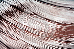 Chocolate paint or chocolate glaze texture.