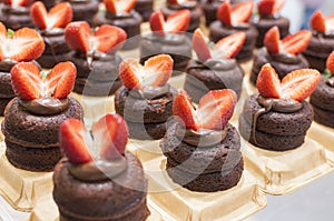 Chocolate pastries with a strawberries