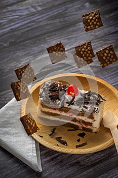 Chocolate pastry on a plate with copy space