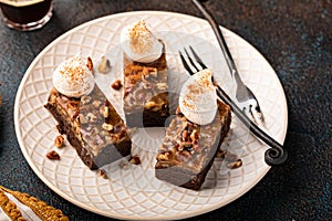 Chocolate pecan pie bars with caramel sauce