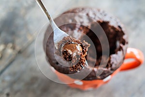 Chocolate pie in a cup filled with a liquid