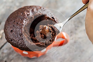 Chocolate pie in a cup filled with a liquid