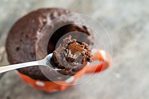 Chocolate pie in a cup filled with a liquid