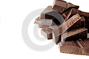 Chocolate pieces isolated on white