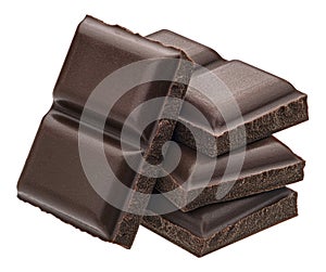 Chocolate pieces stack isolated on white background, full depth of field