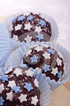 chocolate pralines with blue and white stars