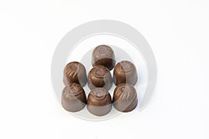 Chocolate pralines isolated on white background