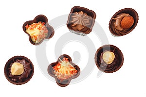 Chocolate pralines isolated on a white background. top view