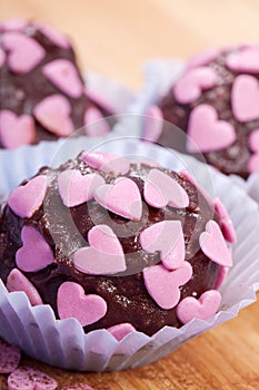 Chocolate pralines with pink hearts