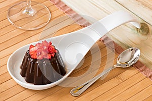 Chocolate pudding with strawberries