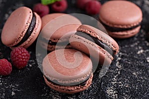 Chocolate and raspberry french macarons with ganache filling