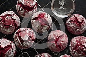 Chocolate 'Red velvet crincles' cookies in powdered sugar