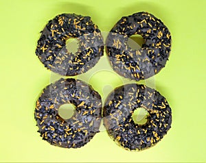 Chocolate ring doughnuts with sprinkles