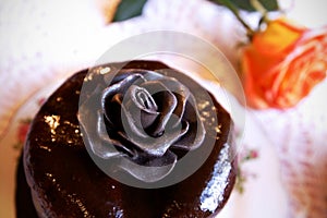 Chocolate rose on a top of cake