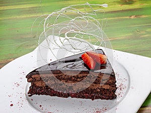 Chocolate Sacher cake with strawberries