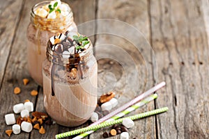 Chocolate shake with sauce and marshmellows