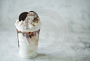 Chocolate smoothie with cookie on table background, concept for drink and summer dessert