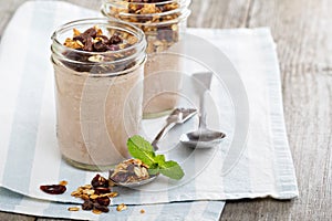 Chocolate smoothie with granola for breakfast