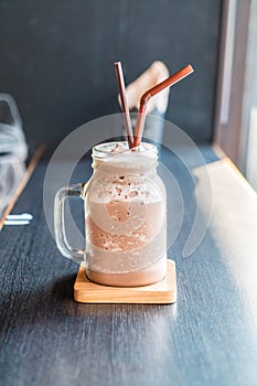 Chocolate smoothie (milkshake) with jar