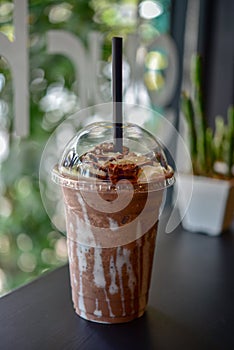 Chocolate smoothie milkshake with jar in cafe