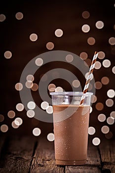 Chocolate smoothie or milkshake with party lights