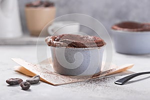 Chocolate Souffle with frozen blueberry . French traditional dessert