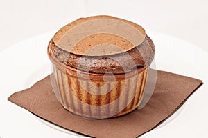 Chocolate souffle in ramekin