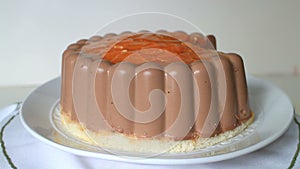 Chocolate soufflé cake with oranges, rotating