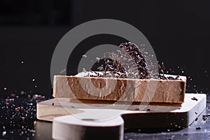 Chocolate sprinkled on sliced bread