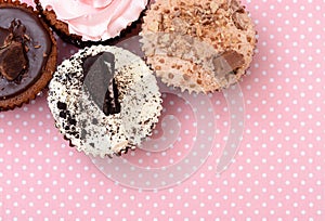 Chocolate Strawberry Cookies and cream cup cake on vintagetable cloth