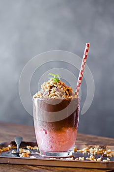 Chocolate and strawberry smoothie with rice krispie treats topping