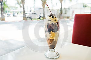 Chocolate sundae in the clear glass cup